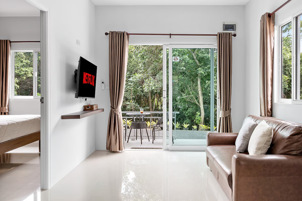 Living room with sofa and sliding doors onto the porch